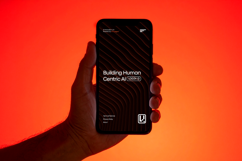 V-Core AI mobile site mockup — "Building Human Centric AI" headline